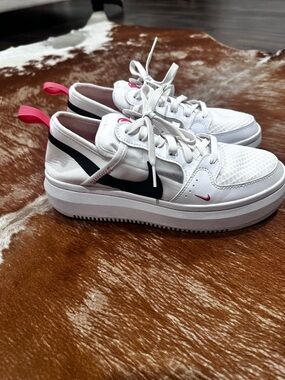 Nike White Sneakers with Black Swoosh and Pink Accents
